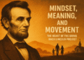 Illustration of Abraham Lincoln’s profile with a glowing sunrise in the background. A silhouetted family walks toward a church at the foot of golden hills. Text reads: “Mindset, Meaning, and Movement – The Heart of the Bring Back Lincoln Project.”