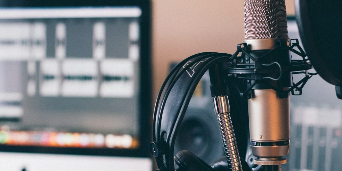 black and silver headphones and microphones