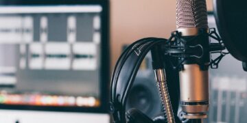black and silver headphones and microphones