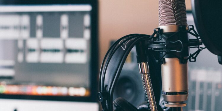 black and silver headphones and microphones