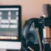black and silver headphones and microphones