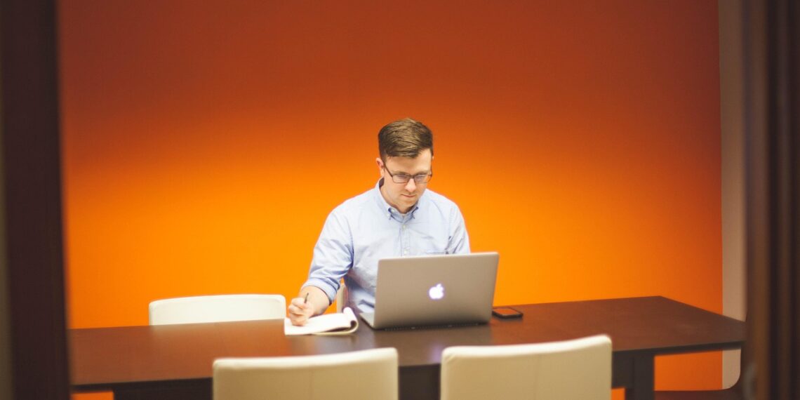 man using laptop